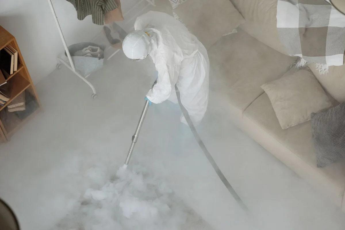 Biohazard cleanup technician in protective equipment, Richfield, UT